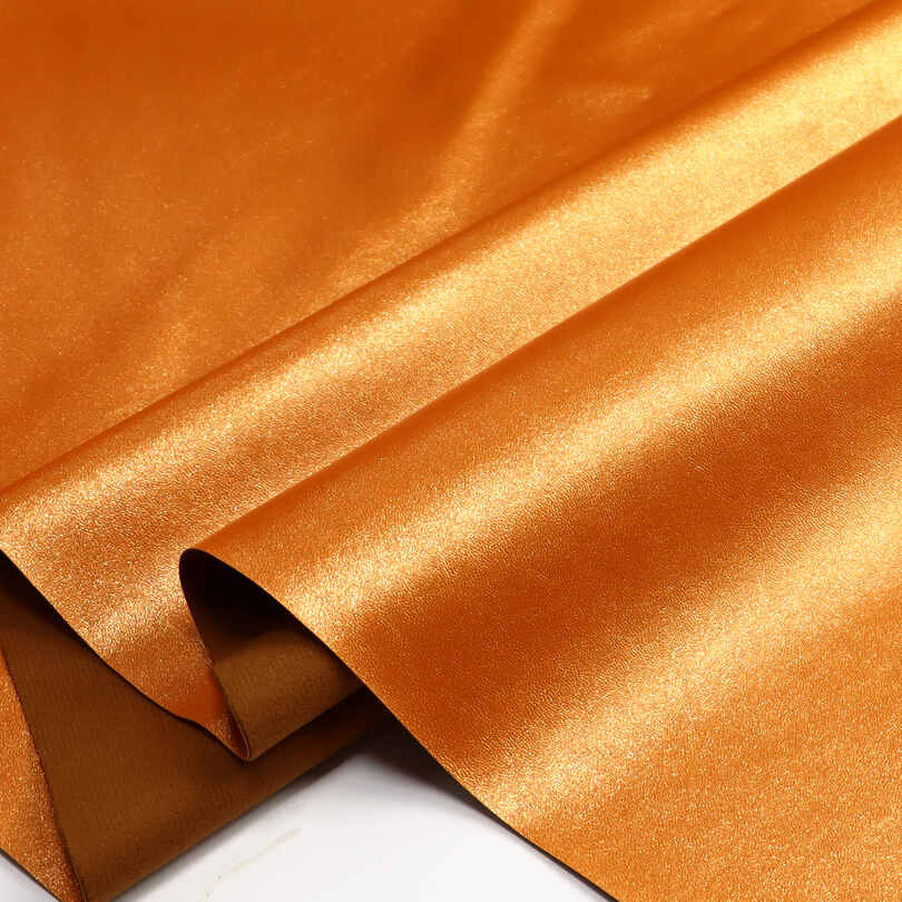 Материал женской сумки из блестящей жемчужной искусственной кожи из искусственной кожи